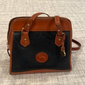 Dooney and Bourke classic bag. I think I bought it around 1999. Great condition.